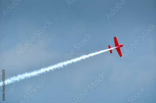 stunt plane trailing smoke