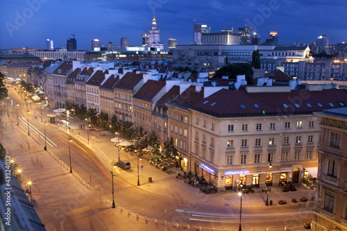 Night view of Warsaw old town, stormy sky. Poland