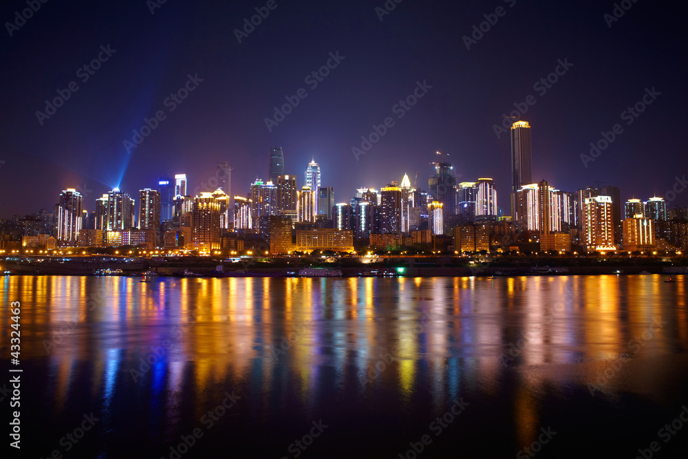 Fototapeta premium Skyscrapers reflecting in the river
