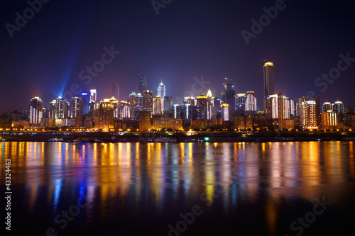 Skyscrapers reflecting in the river