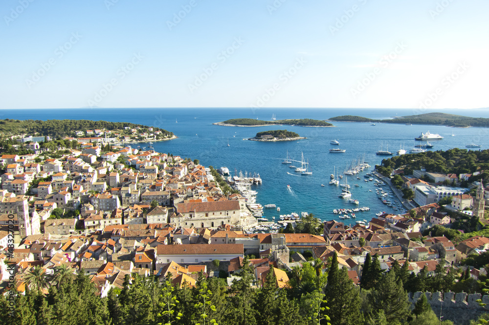 Naklejka premium Hvar, harbor of old Adriatic island town. panoramic view. Popula