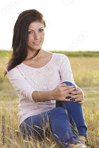 beautiful young woman in nature photo