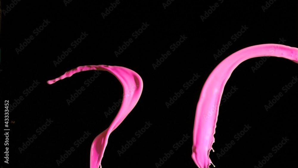 Pink paint lines in super slow motion mixing Pink paint lines in super slow motion mixing