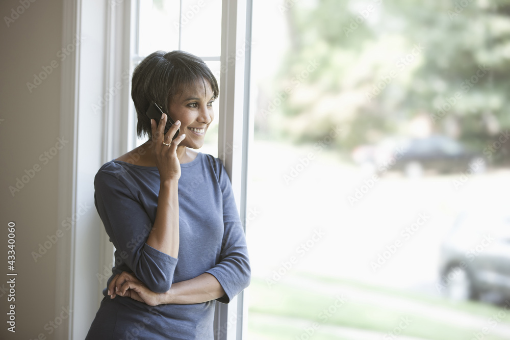 Native American woman talking on cell phone Native American woman talking on cell phone