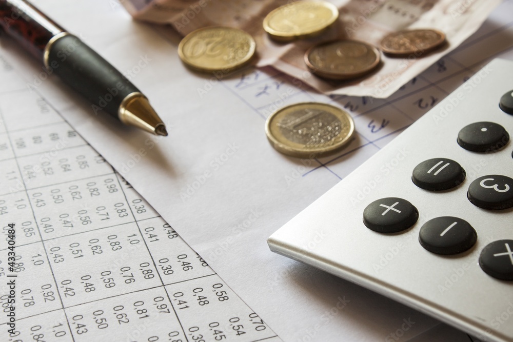 financial composition on the table with money, calculator financial composition on the table with money, calculator