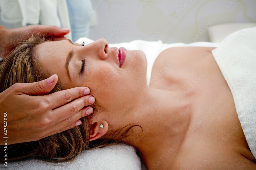 Hispanic woman having facial Hispanic woman having facial