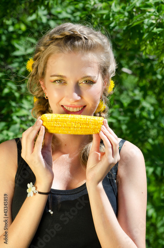 woman eating corn-cob