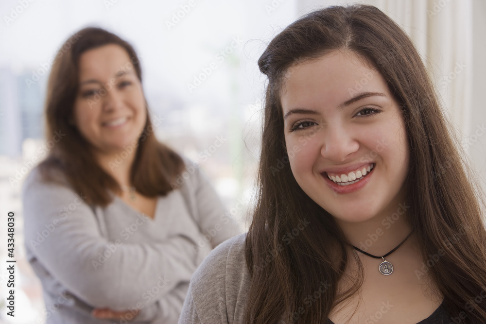Smiling Chilean mother and daughter Smiling Chilean mother and daughter