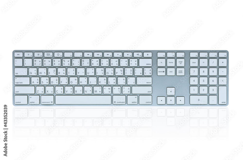 Modern aluminum computer keyboard isolated on white background Modern aluminum computer keyboard isolated on white background