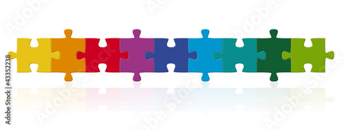 farbige Puzzleteile in Reihe