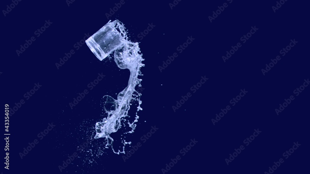 Glass with liquid thrown in super slow motion Glass with liquid thrown in super slow motion
