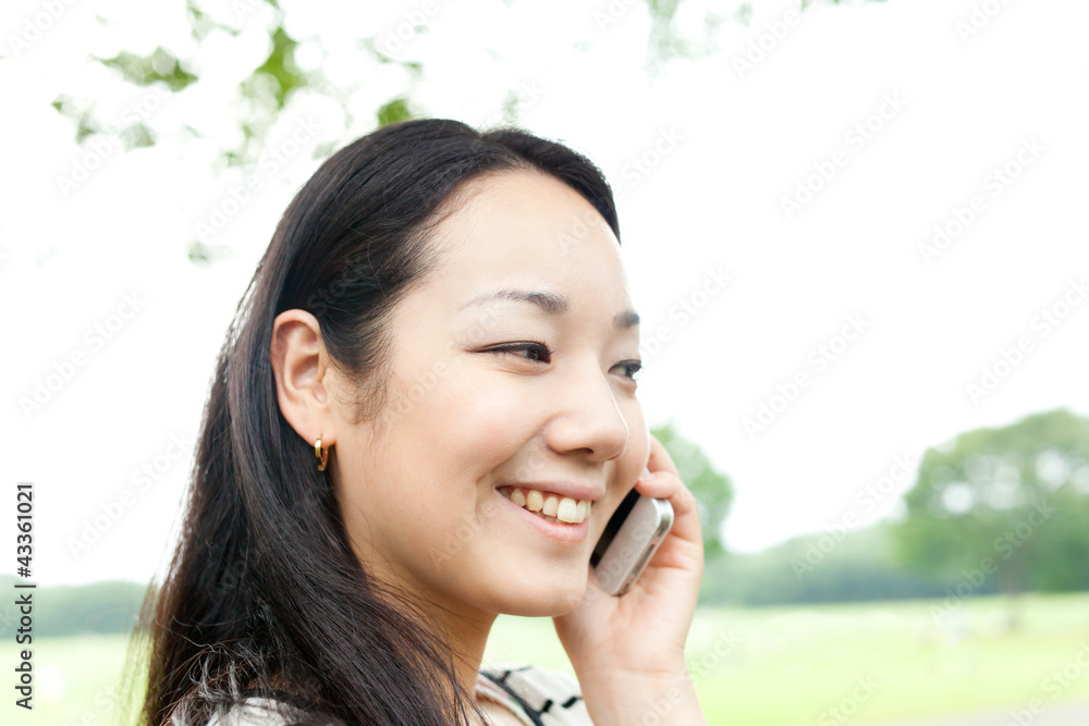 Beautiful young woman in the park. Portrait of asian Beautiful young woman in the park. Portrait of asian