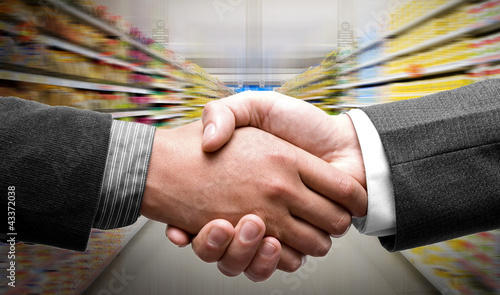 Handshake at supermarket