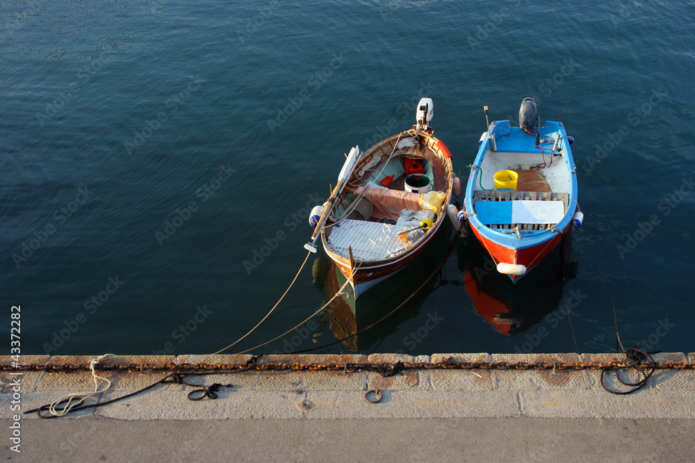 Fototapeta premium Colorful fisherman boats in marina, Elba, Tuscany, Italy