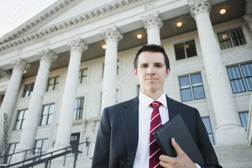 Caucasian businessman standing outdoors