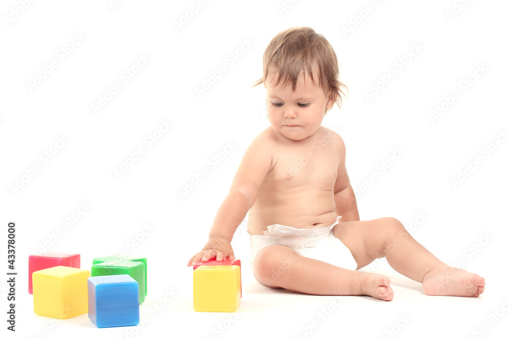 Cute baby playing with cubes isolated on white Cute baby playing with cubes isolated on white
