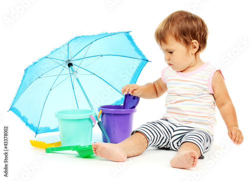 Cute baby with bucket and s...