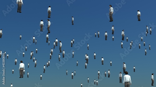 Sky is filled with floating men. photo