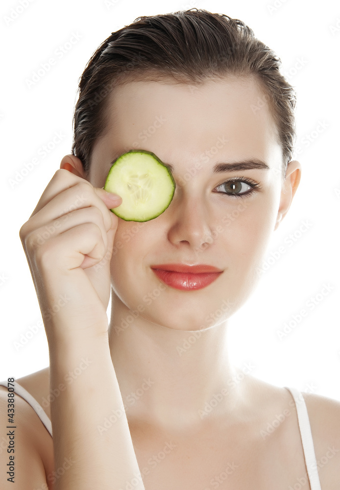 young woman with mask from a cucumber isolated young woman with mask from a cucumber isolated