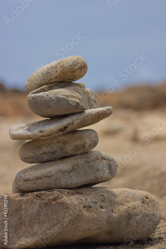 man-made pile of rocks near Natural Bridge, Aruba