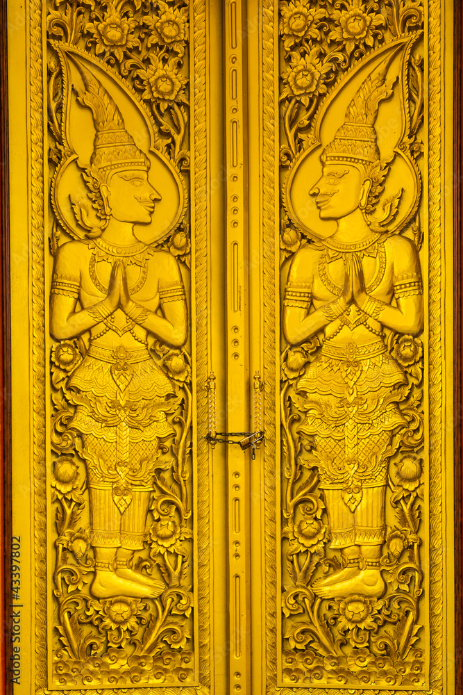 Latham at gold door of temple thailand
