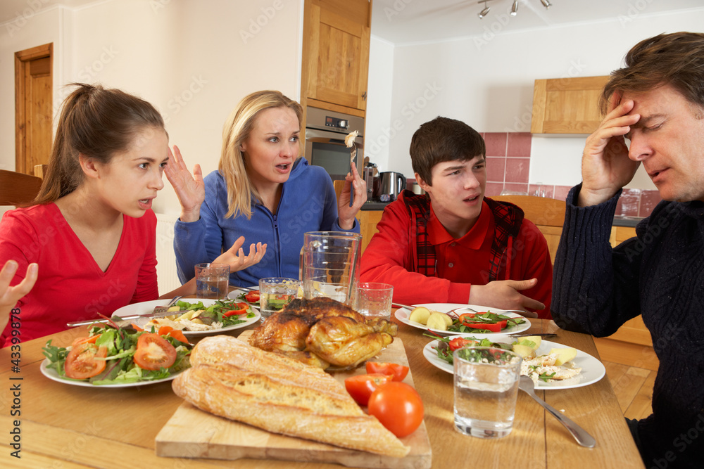 Teenage Family Having Argument Whilst Eating Lunch Together In K
