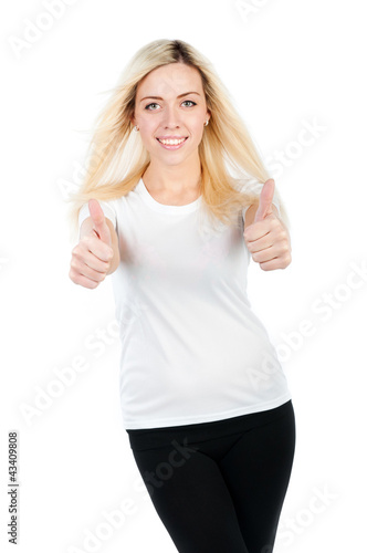 athletic girl shows two thumbs © Ievgen Getmanets