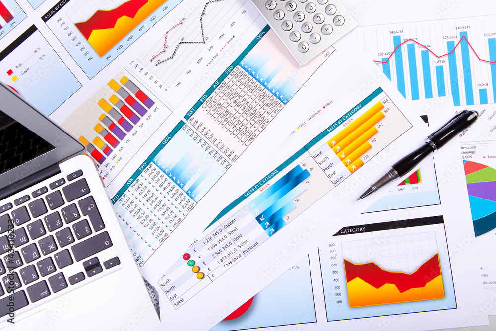 Financial papers on the table Financial papers on the table
