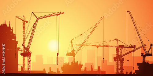 Lots of Tower Cranes on Construction Site
