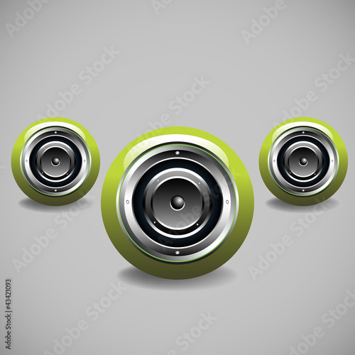 Three modern green loudspeakers