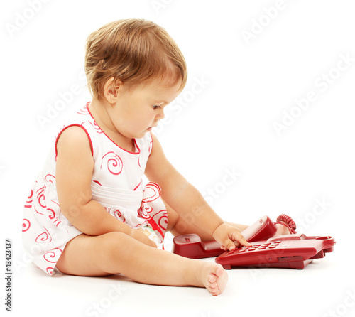 Cute baby with telephone isolated on white