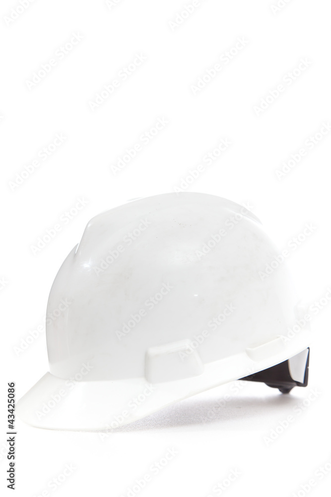 Helmet on white isolated for wear when working at site or worksh Helmet on white isolated for wear when working at site or worksh
