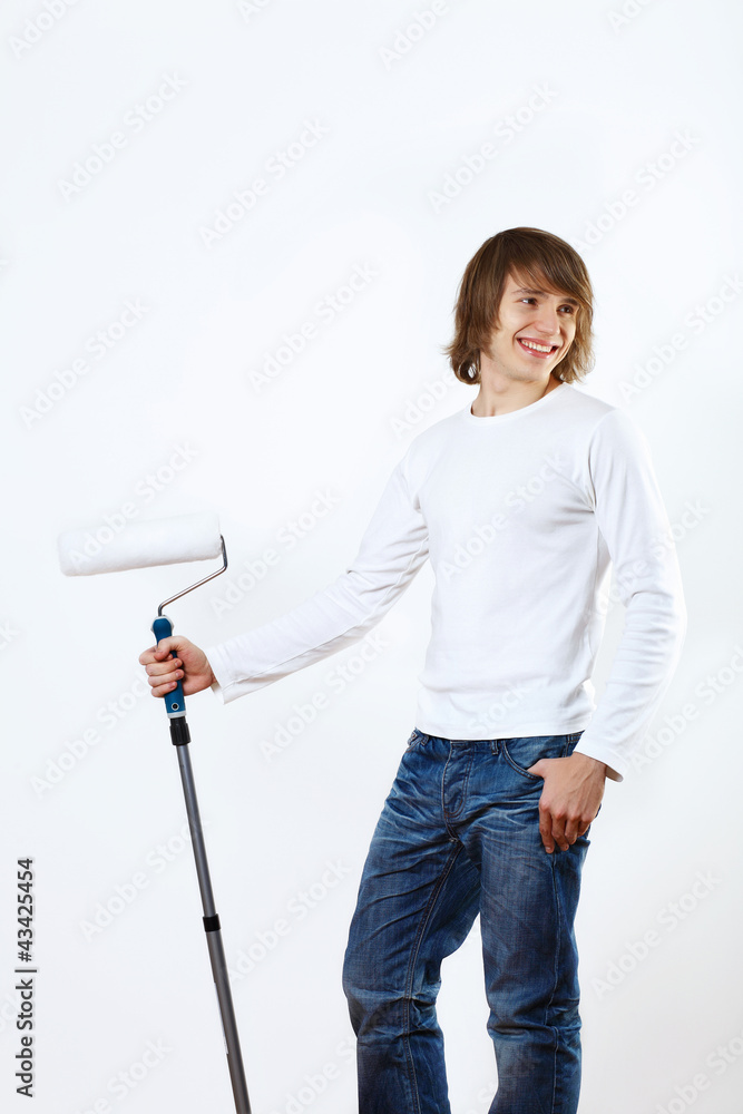 Man with paint brushes Man with paint brushes