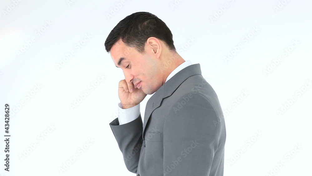 Side view of a businessman calling with his phone Side view of a businessman calling with his phone