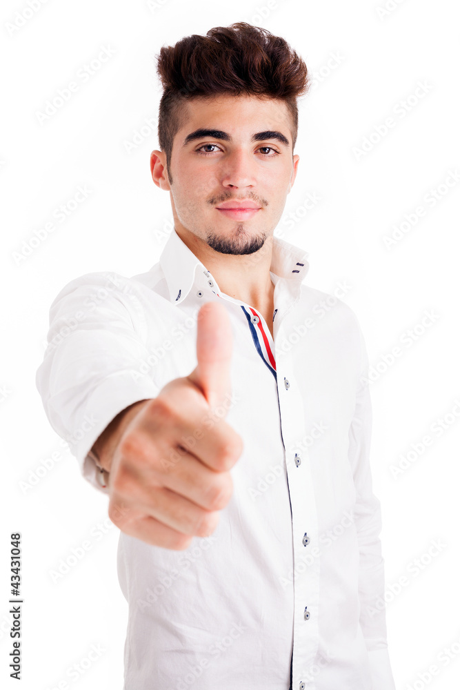 Smiling young casual man thumbs ups, isolated on white backgroun Smiling young casual man thumbs ups, isolated on white backgroun