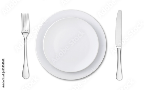 overhead view of an empty place setting isolated on white