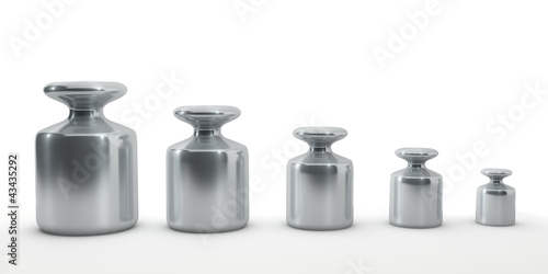Row of calibration weights isolated on white. photo