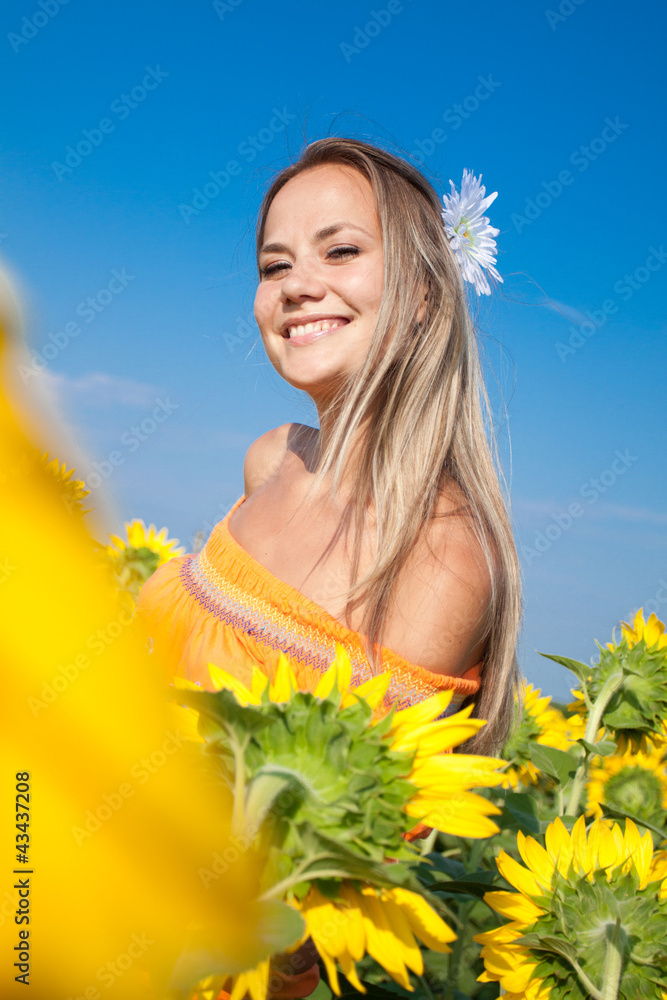 Happy girl in sunflower field Happy girl in sunflower field