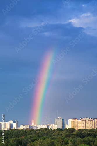 rainbows under city