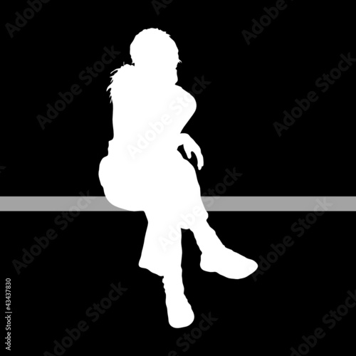 girl sitting with black background