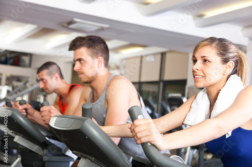 Group of people training in a fitness club