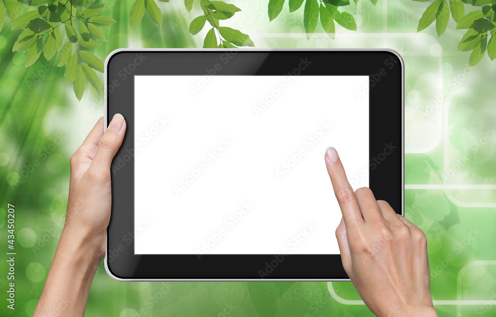touch screen on tablet pc. with leaves background.