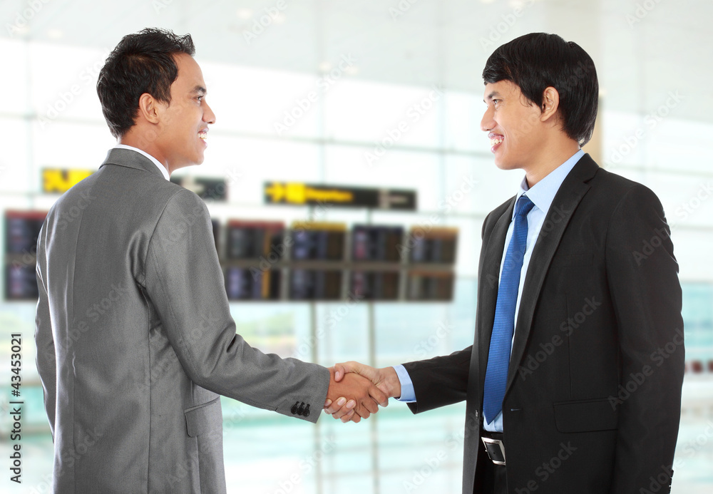 business colleagues shaking hands business colleagues shaking hands