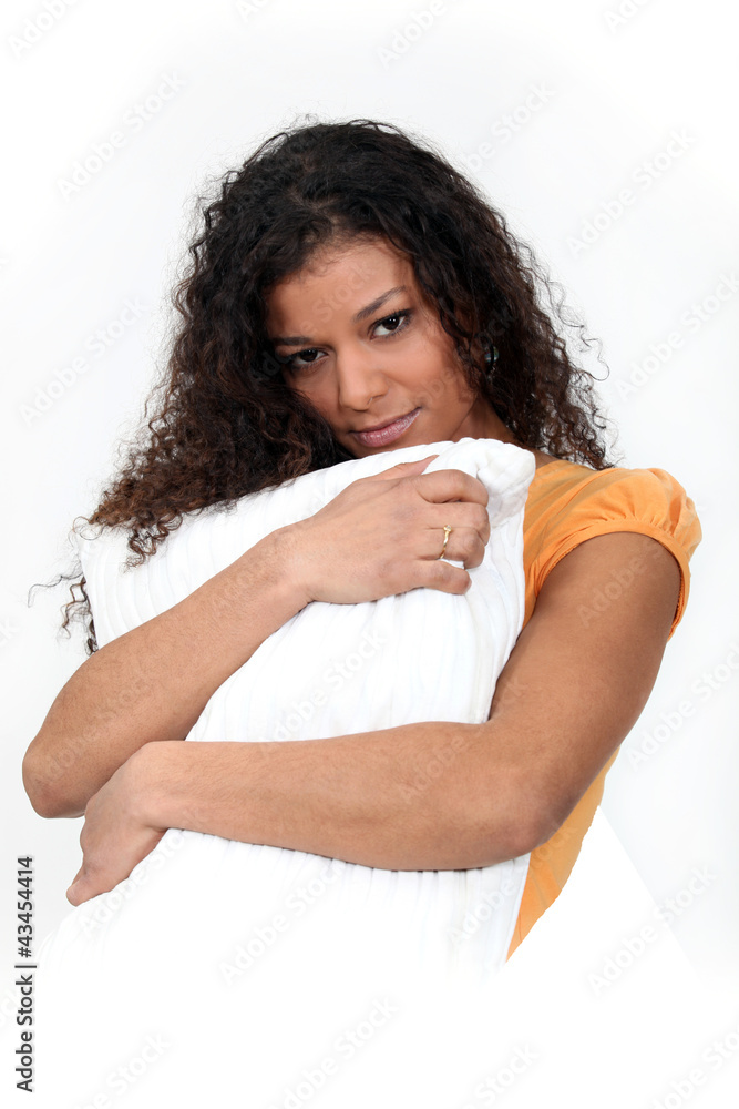 Woman holding pillow