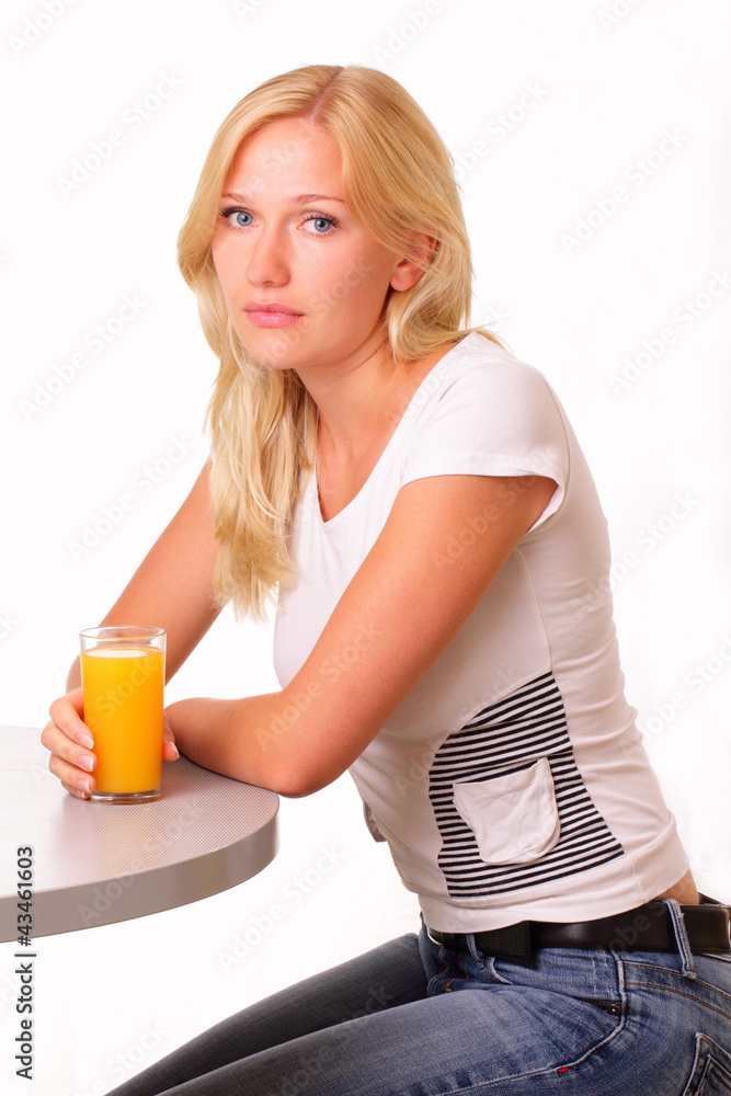 Attractive young woman with a glass of juice