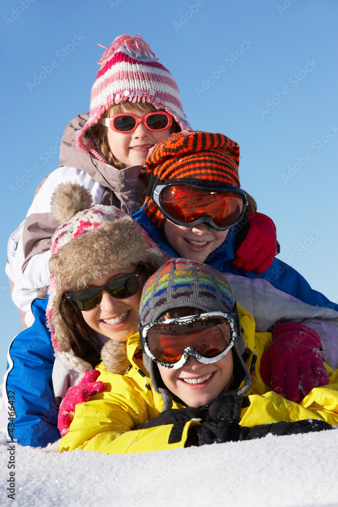 Group Of Children Having Fun On Ski Holiday In Mountains Group Of Children Having Fun On Ski Holiday In Mountains