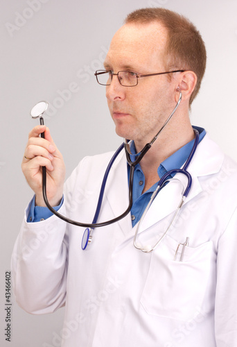 Medical doctor with stethoscope
