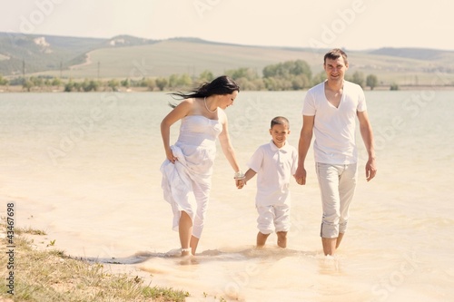 young family with a sun on the nature