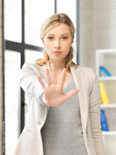 young woman making stop gesture