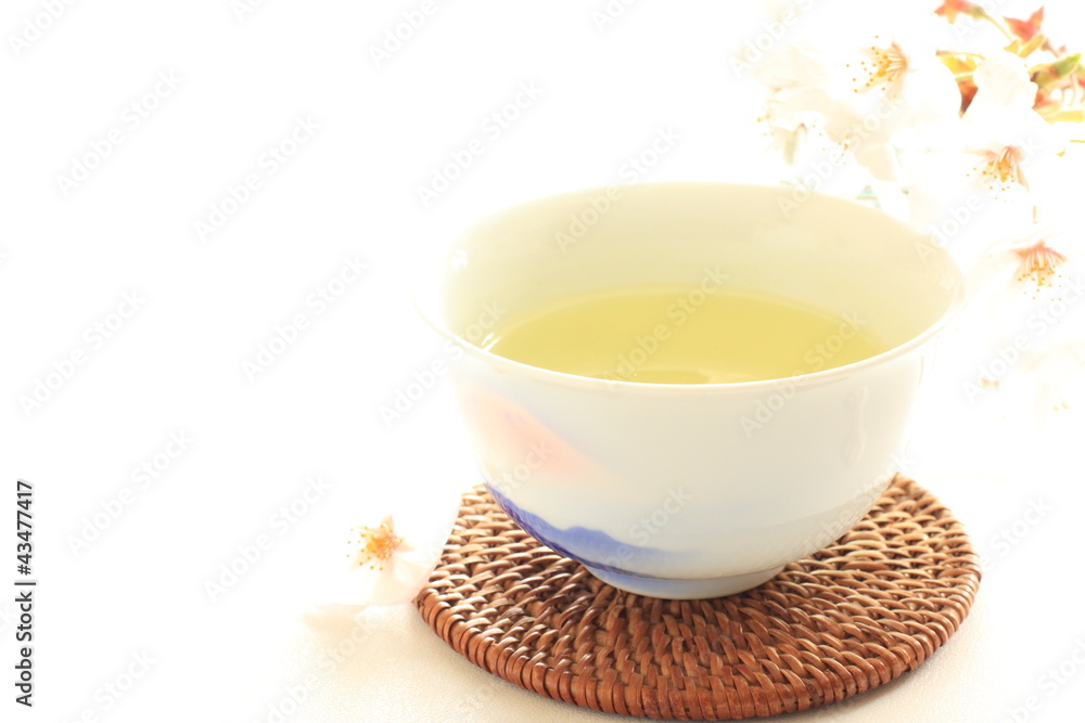 Japanese green tea with cherry blossom for spring image Japanese green tea with cherry blossom for spring image